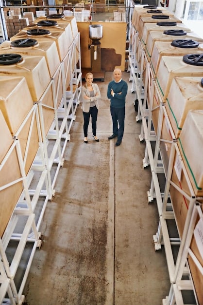 A behind-the-scenes shot of a warehouse or fulfillment center, showing the process of packing and shipping Kings League merchandise. The image highlights the efficiency and organization of the logistics operation.